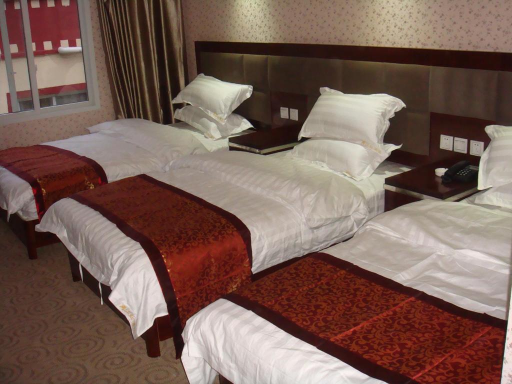Jiuzhaigou Man Jiang Hong Hotel จิ่วไจ้โกว ห้อง รูปภาพ